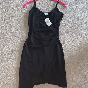 “Almost famous” black shift dress